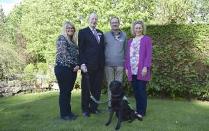 (right to left) Fiona Corner, Project Manager with the Dementia Dog Project, with Rotarians Stuart Brown and Peter Farr, and Kerry Gough, Dementia Dog Project, together with Dementia Dog Ruby